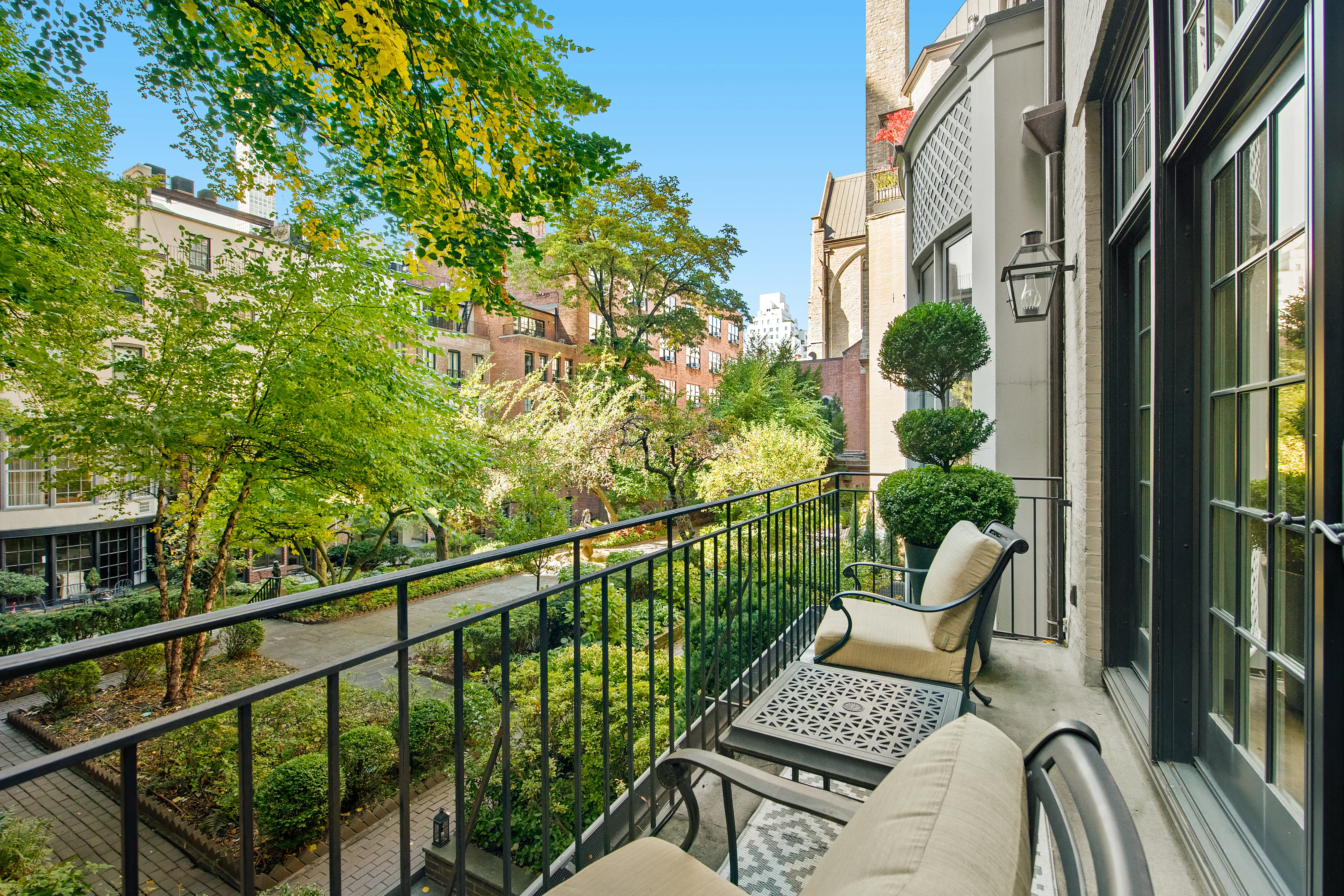 See inside a secret NYC garden that only 12 homes can enjoy — 4 of which are for sale
